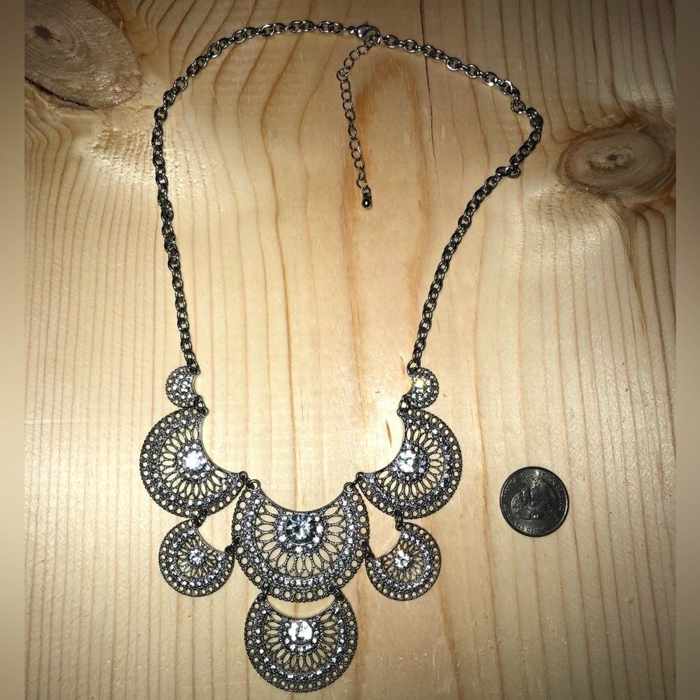silver necklace tiered